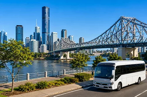 brisbane bus hire with coach near city skyline